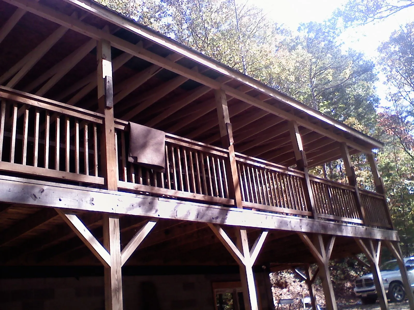 Timber framing under a new elevated porch and deck — Roof Leak Repair in Joplin by Roofing Brothers